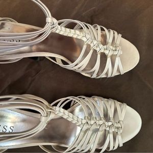 Guess Toggle heels. 4 1/2 “with 1”Platform. Strappy. Ivory Leather.